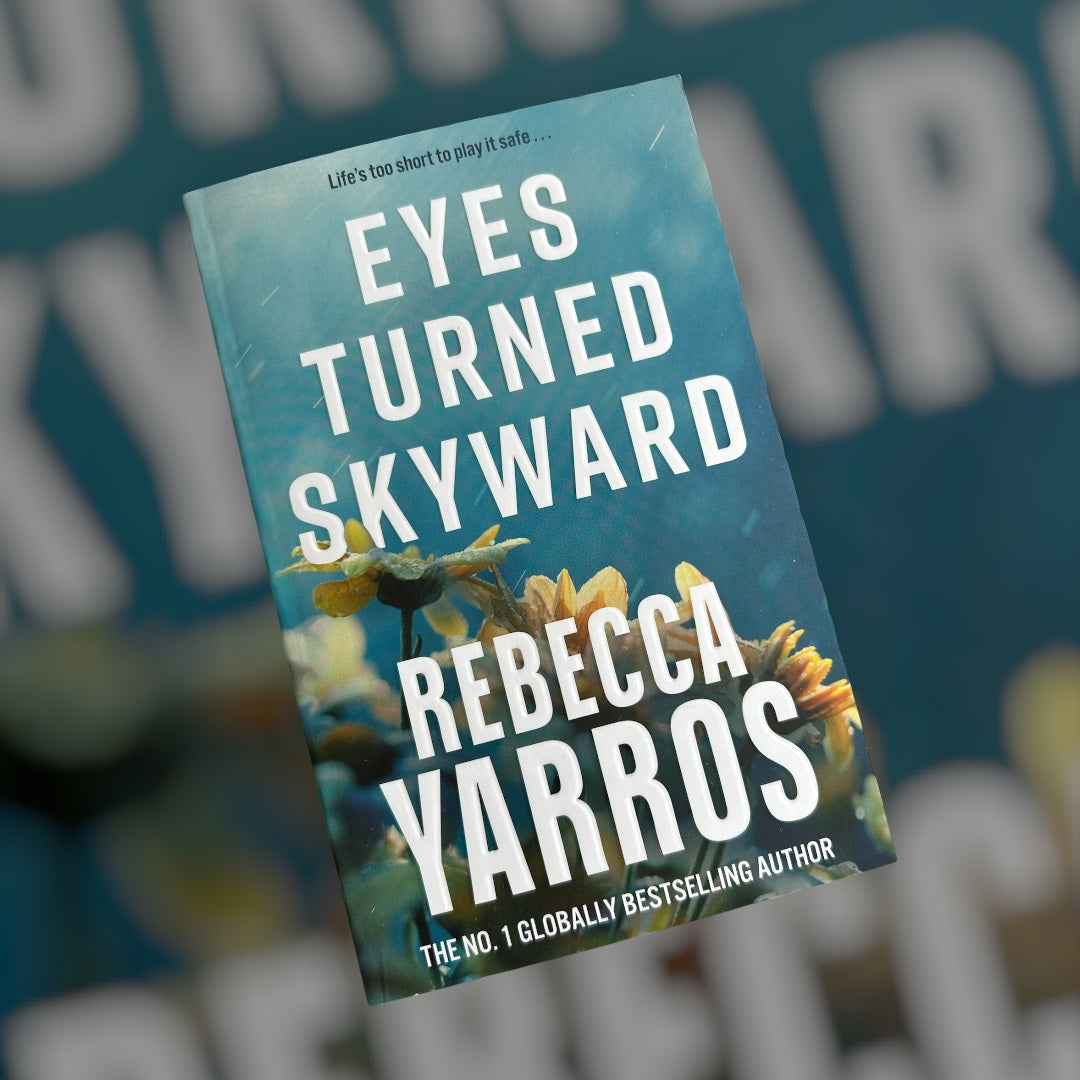 Eyes turned skyward · Rebecca Yarros